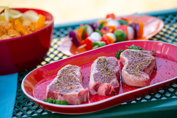 Uncooked New York Steak with Sides
