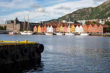 Fototapeta na wymiar Cityscape of the Bergen city in Norway with ships and pier