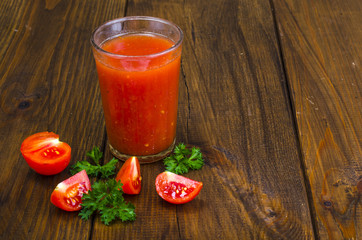 Natural freshly squeezed tomato juice in glass