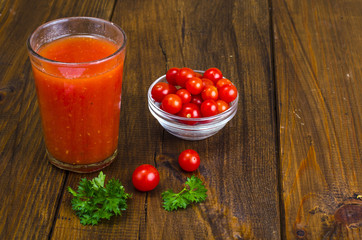 Natural freshly squeezed tomato juice in glass