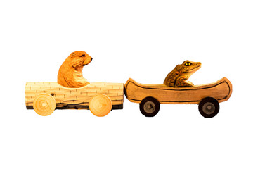 Wooden toy hedgehog and alligator driving small wood sports cars humorous concept for traffic jam,...
