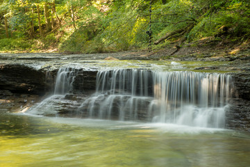 Waterfall on small creek in late summer