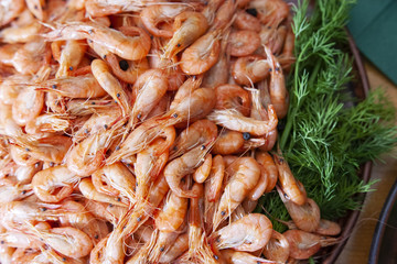 Shrimp. Shrimps lie on a plate. Boiled ready-to-eat shrimp. A large dish of small shrimps