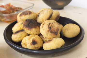 yellow corn arepas, traditional food of colombia