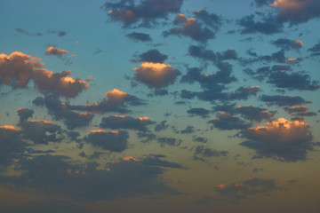 Fototapeta na wymiar Beautiful colorful sunset with dramatic cloudy sky background