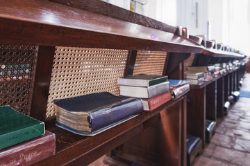 Religious books in different languages lie on the shelves in the St Andrew's Cathedral, Singapore.
