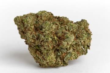 Close up macro photo of recreational and medical prescription hybrid strain  wedding cake flower on white background