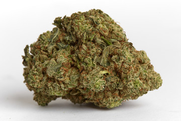 Close up macro photo of recreational and medical prescription hybrid strain  wedding cake flower on white background