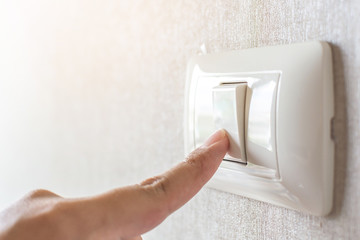 Concept save energy. Hand turning off switch