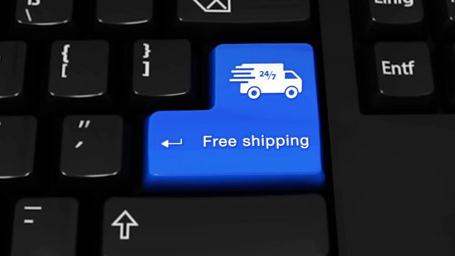 465. Free Shipping Rotation Motion On Blue Enter Button On Modern Computer Keyboard with Text and icon Labeled. Selected Focus Key is Pressing Animation. Delivery Services Concept