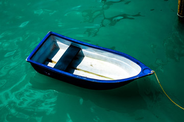 Obraz premium A blue dingy at Chalong Pier, Phuet Thailand