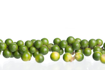 Fresh black pepper on white background
