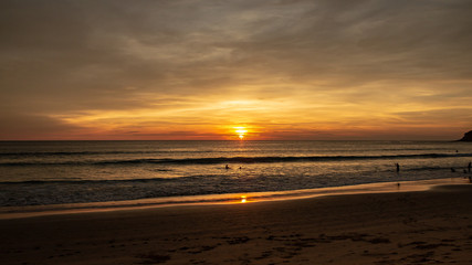 Fototapeta premium Karon Beach Sunset with Sun at Horizon