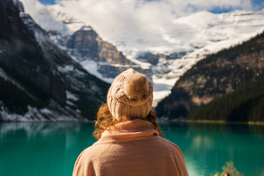 Young woman admiring the beautiful view at Lake Louise