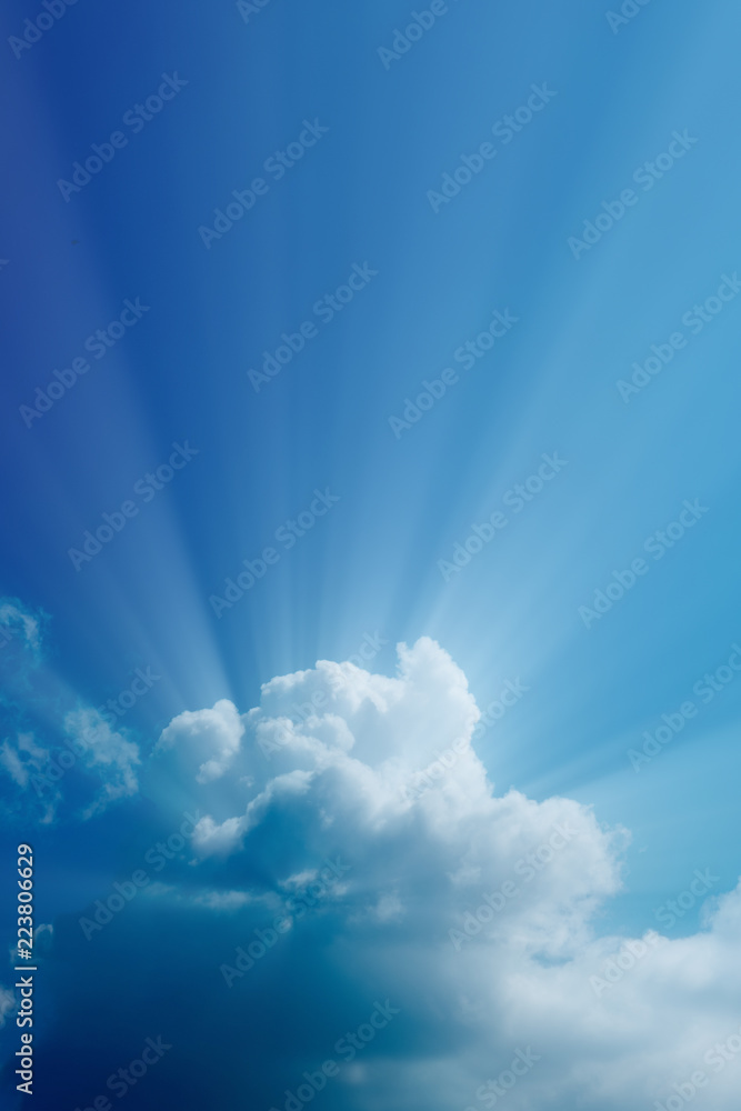 Wall mural sunbeam through the haze on blue sky