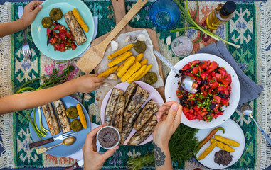 Healthy paleo diet food. Vegan lunch, vegetarian dinner, grilled  roasted vegetables, eggplants, corn bread sticks, fresh summer salad with tomatoes, fresh greens. Summer, raw organic products