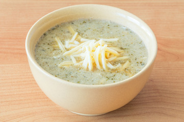 Garlic soup with cheese on the top.