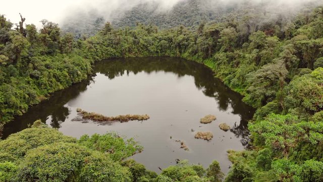 Volcanic Crater lake. surrounded by primary montane rainforest, on the flanks of Volcan Sumaco, in the Ecuadorian Amazon