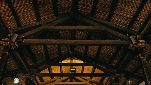 church interior with wooden structure and traditional roof
