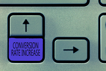 Conceptual hand writing showing Conversion Rate Increase. Business photo showcasing Ratio of Total Visitors who perform desired actions.