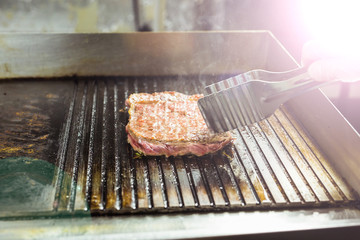 Food and cooking concept - Grilled meat. Juicy steak from beef or pork