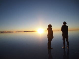 couple on the beach at sunset
