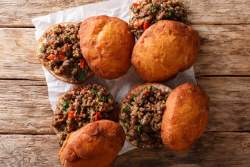 South African Vetkoek aka Fat Cake, crispy outside and warm and fluffy inside filled with minced...