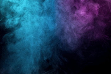 Colorful smoke on black background