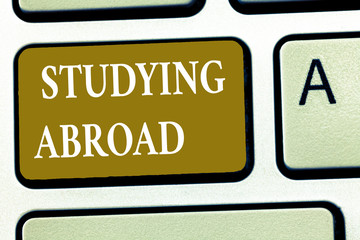 Text sign showing Studying Abroad. Conceptual photo learn outside of home in foreign country Travelling.