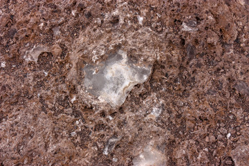 Volcanic red soil texture with sea salt