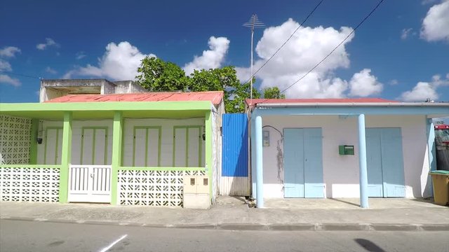 Walking on a street in Marie-Galante seeing typical houses