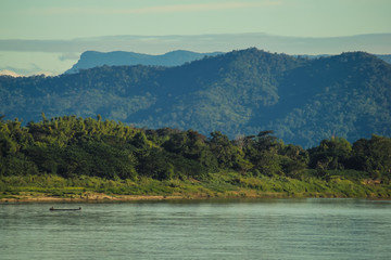 Atmosphere sunset at the Mekong river is bordered by Thailand and Laos