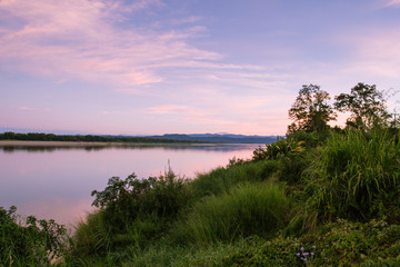 Atmosphere sunrise at the Mekong river is bordered by Thailand and Laos