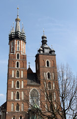 The view on beautiful medieval towers of St Mary's Basilica in day light, Krakow, Poland