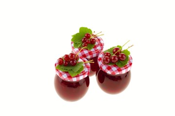 currant jam.red currant jam and currant with leaves isolated on white background. Berry season. Currant crop