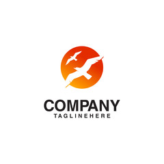 flying bird sun logo