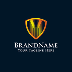 initial letter Y shield logo with gold color