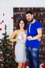 Marry Christmas and happy new year 2018. Couple celebrate with light
