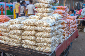 Popcorn and fries displayed in a local street shop