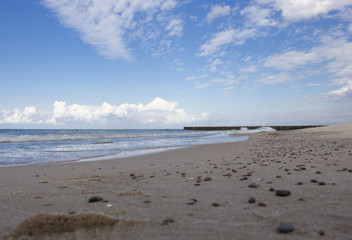 background, sandy beach against turquoise sea and blue sky
