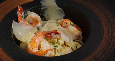 Tolatelli with king prawns and parmesan cheese