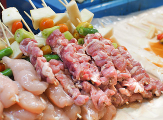 Skewers of meat and spices for BBQ Grill.