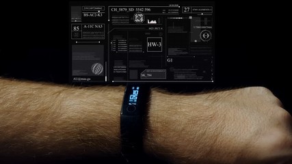 Man hands using smart watch with future media hologram. HUD - Powered by Adobe