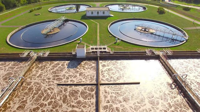 Aerial view to sewage treatment plant. Grey water recycling. Waste management theme. 