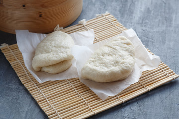 Gua bao, steamed buns in bamboo steamer, bao buns.