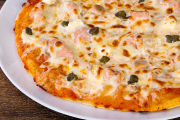 Pizza with salmon and capers