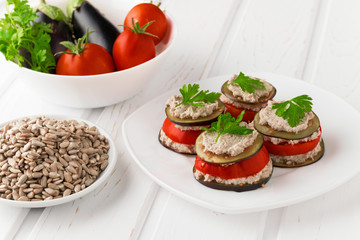 Appetizing appetizer of raw eggplant and tomato, healthy food