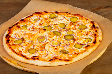 Pizza with pickled cucumbers