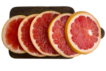 Grapefruit slices, fresh juicy slices. Top view.