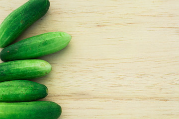 cucumber on wood background,Space for text.